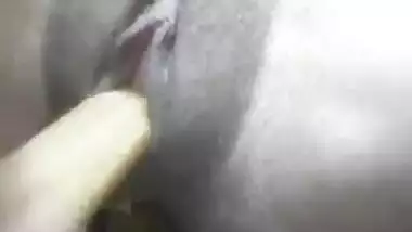 Desi girl masturbating pussy with a stick