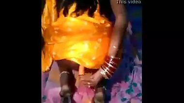 Village ass fucks an orange dildo
